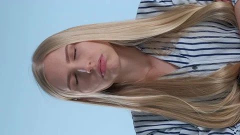 Young blonde woman refusing something and showing that she is bored enough Stock Footage 155762026