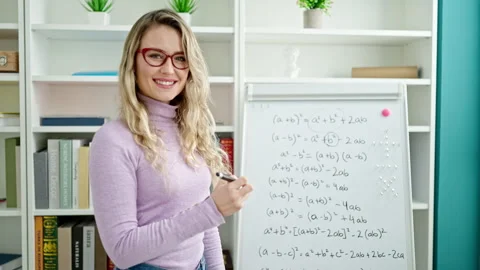 Young Blonde Woman Teacher Teaching Math... | Stock Video | Pond5