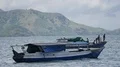 Young boat people kids on anchored traditional indonesia small ship at coast 4k or 4k+ Resolution