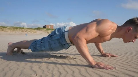 Young Body builder doing pull ups in summer day outdoor Video stock 84042042