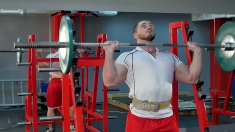 Young bodybuilder doing weight lifting in the gym 스톡 동영상 74125964