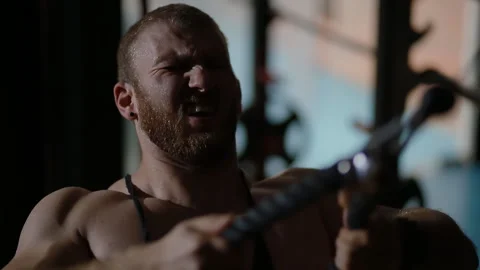 Young bodybuilder performs the upper block to the chest Stock Footage 102511942