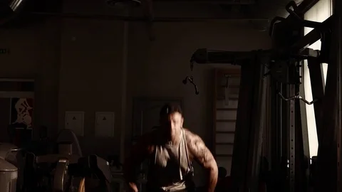 Young bodybuilder training in a gym. 4K UHD Stock Footage 75835867