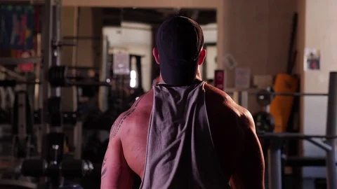 Young bodybuilder training in a gym. 4K UHD Stock Footage 75836239