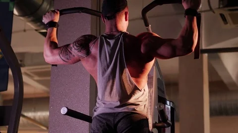 Young bodybuilder training in a gym. 4K UHD Stock Footage 75836330