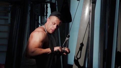Young bodybuilder training in a gym. 4K UHD Stock Footage 75836492