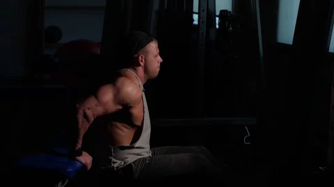 Young bodybuilder training in a gym. 4K UHD Stock Footage 75836723