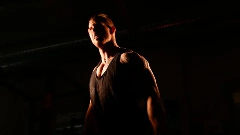 Young bodybuilder training in a gym Stock Footage 74313396