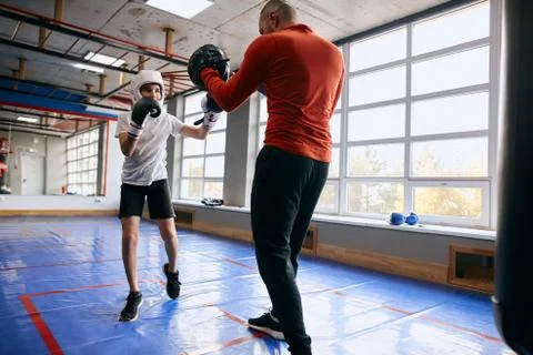 Young boxer attending boxing classes Stock Photos
