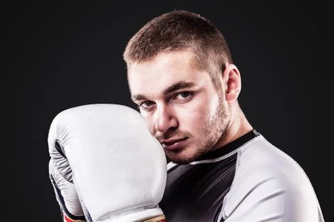 Young boxer on black Stock Photos