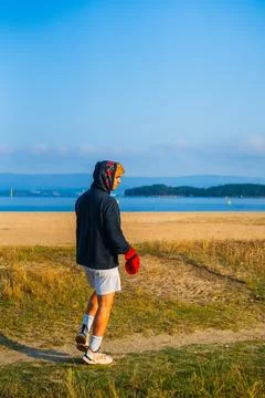 Young boxer getting ready to his training with a sea view Stock Photos