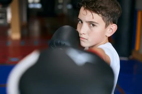 Young boxer hitting the camera Stock-Fotos