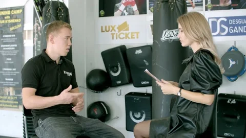 Young boxer is interviewed in the ring Stock Footage 141268804