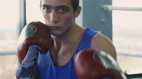 Young boxer looking at camera Stock Footage 57699647