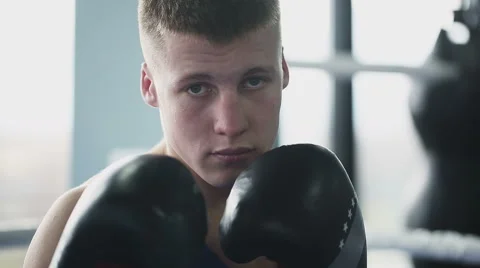 Young boxer looking at camera Stock Footage 57699651