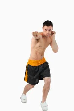 Young boxer on the offensive Stock Photos