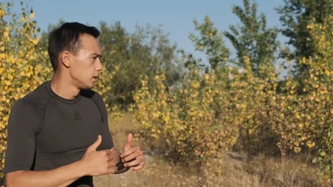 Young boxer preparing for training in the park Stock Footage 111806586