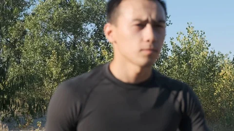 Young boxer preparing for training in the park Stock Footage 111806735