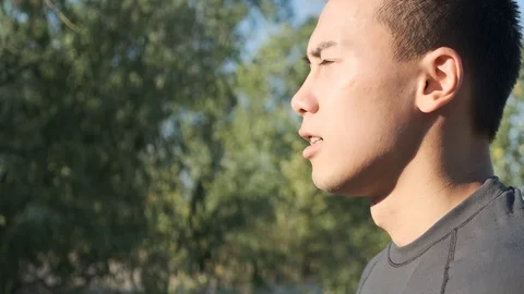 Young boxer preparing for training in the park Stock Footage 111808336