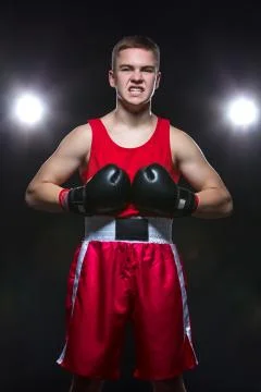Young boxer in red form Stock Photos