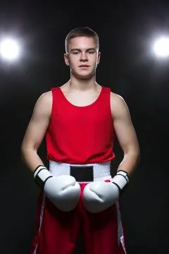 Young boxer in red form Stock Photos