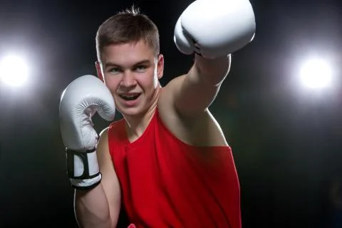 Young boxer in red form Stock Photos