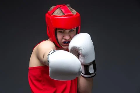 Young boxer in red form Stock Photos
