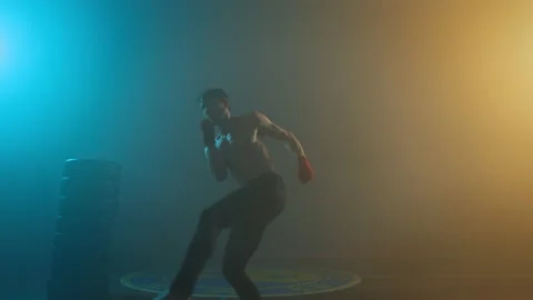 Young Boxer Trains In Ring. Man Makes Leg Movements. Handsome Man With Naked Stock Footage 160765336