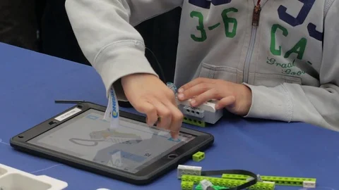 Young boy assembling electronic device at maker space Stock Footage 83202351