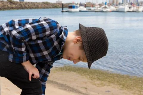 Young Boy Bending Over Stock Photos