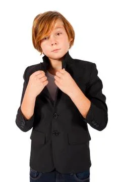 Young boy in a black jacket Stock Photos