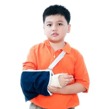 Young boy with broken hand in plaster cast Stock Photos