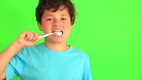 Young boy brushing his teeth 2 Stock Footage 74527852