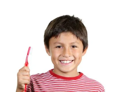Young boy brushing teeth Stock Photos