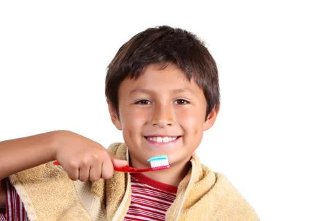 Young boy brushing teeth Stock Photos