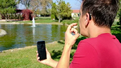 Young boy communicating with sign language  at smart phone Stock Footage 110864955