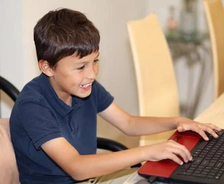 Young boy on a computer Stock Photos
