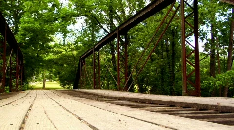 Young Boy Crossing a Bridge Stock Footage 371640