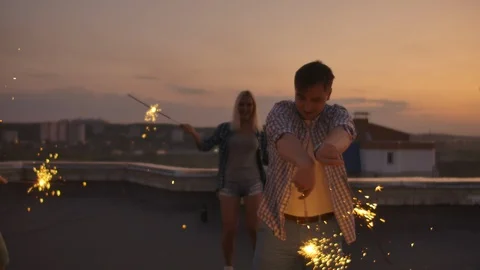 Young boy is dancing with bengal light Video stock 119011554