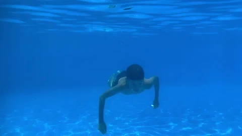 Young boy diving Stock Footage 202645545
