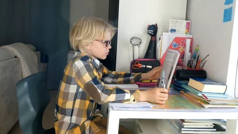 Young Boy Doing His Homework. Vídeos de archivo 116467341