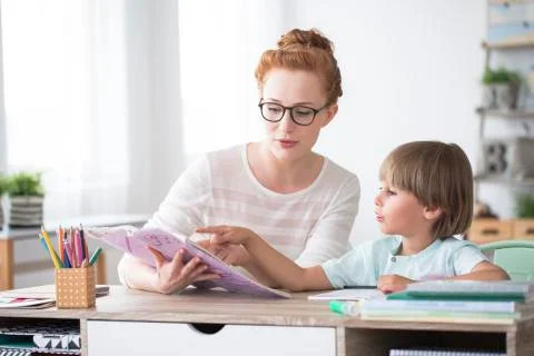 Young boy doing homework Stock Photos