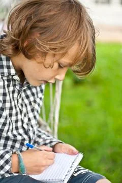 Young boy drawing Stock Photos