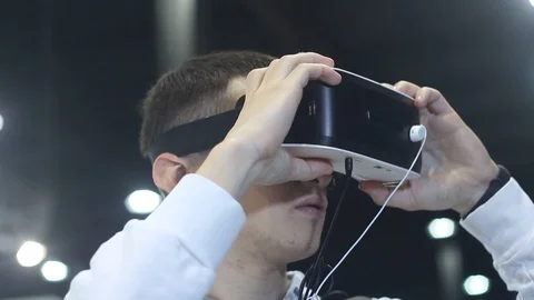Young Boy Dresses Helmet of Virtual Reality Stock Footage 87136135