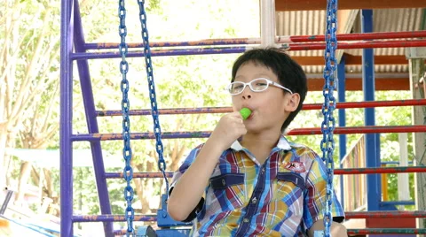 Young boy eating icecream Stock Footage 59585384