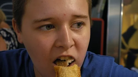 Young boy eating pie Stock Footage 84523187