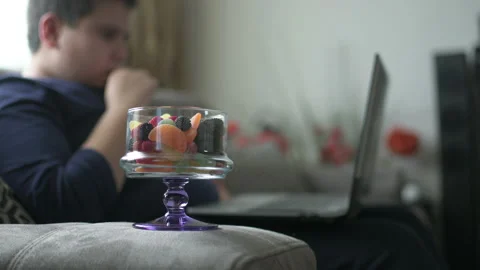 Young Boy Eating Some Candy During E-Learning Stock Footage 152956880