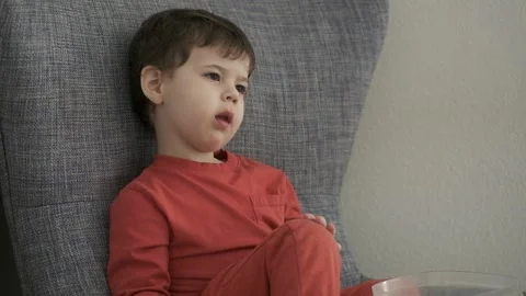 Young boy eating tomatoes Video stock 243384054