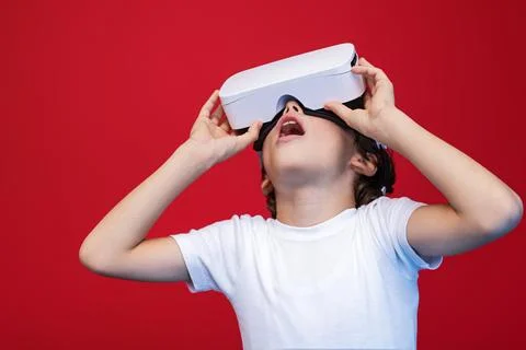 Young Boy Experiencing Virtual Reality With VR Headset Stock Photos
