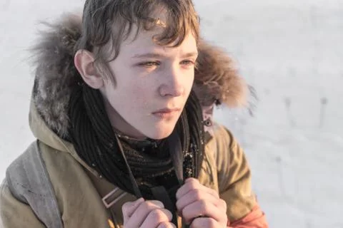 Young boy face close-up Stock Photos